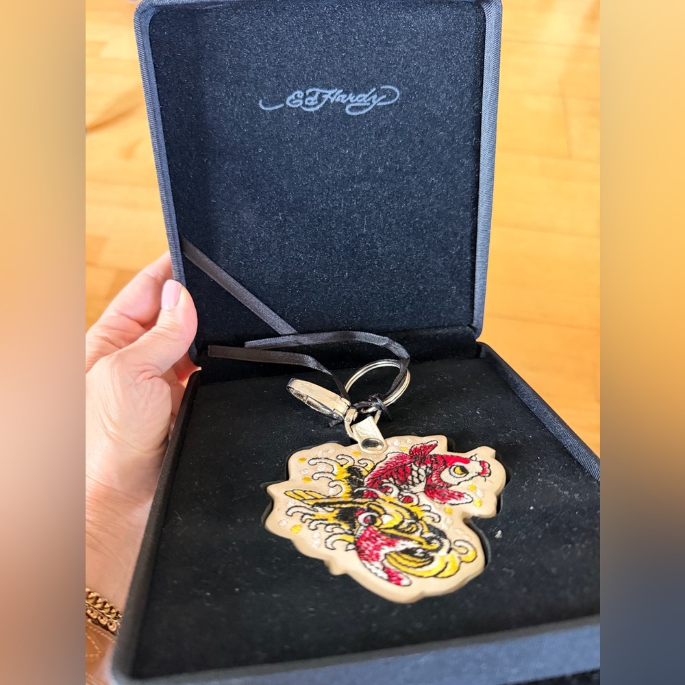 Ed Hardy Red & Yellow  rare Keychain . New in a luxurious velvet box .